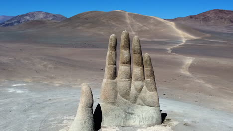 Palm-of-left-hand-sculpture-in-remote-Atacama-desert-by-Chilean-artist