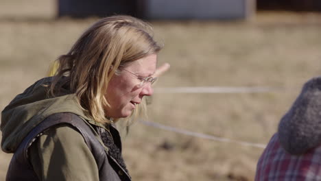 Female-horse-therapy-participant-shares-her-emotional-journey-with-group