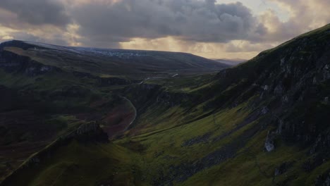 Scenic-aerial-on-the-Quiraing-Walk,-backward-aerial-over-the-Scottish-Highlands,-Isle-of-Skye