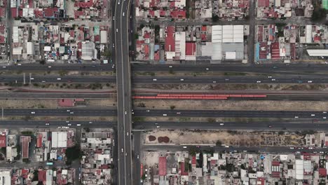 Slow-motion-aerial-view-of-the-Mexico-City-metro-from-a-drone,-Ecetepec