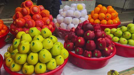 fruit-market-with-apple-in-hand