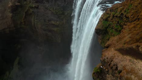 Revealing-shot-of-Skogafoss-waterfall-in-Iceland