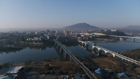 Wide-aerial-footage-of-downtown-Chattanooga-during-the-sunrise-shot-over-north-shore