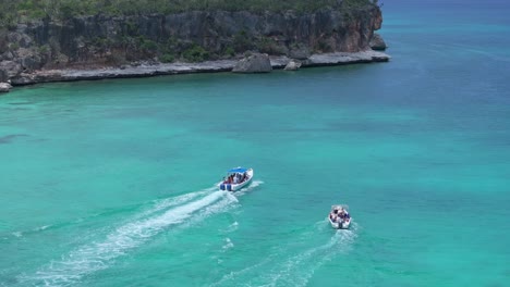 Two-motorboats-with-tourist-visiting-bay-of-las-aguilas-during-sunny-day