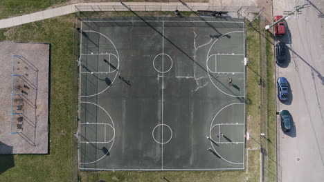 Static-overhead-aerial-footage-of-a-basketball-court-in-a-neighborhood-in-Chattanooga,-TN