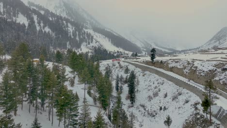 Aerial-View-Of-Snow-Covered-Naltar-Valley-Landscape