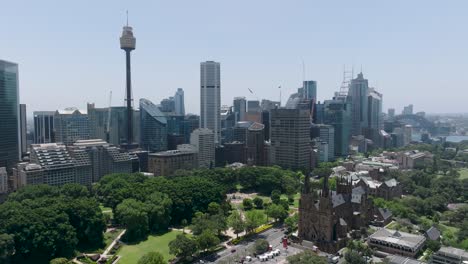 Aerial-drone-view-of-Hyde-Park,-Australia,-with-some-iconic-landmarks:-the-Sydney-Tower-Eye,-St