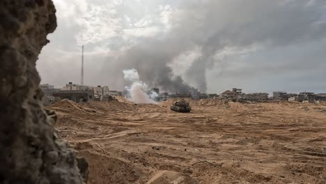 Smoke-coming-out-after-missile-attack-in-the-city-of-Gaza-during-Israel-Hamas-war-armed-conflict,-2024