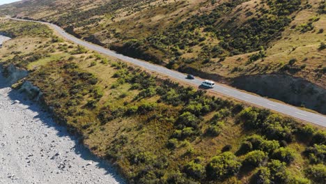 Van-travels-alongside-Lake-Pukaki,-near-the-Mount-Cook