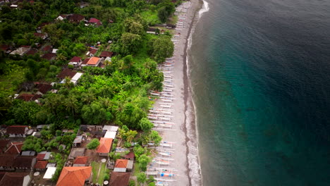 Indonesian-customary-fishing-vessels-as-far-as-the-eye-can-see,-aerial