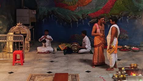 Traditional-Wedding-Rituals-inside-Indian-Hindu-Temple,-Batu-Caves