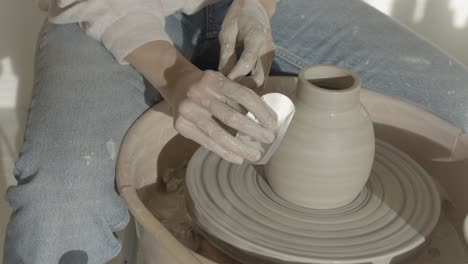 A-female-potter-throwing-a-vase