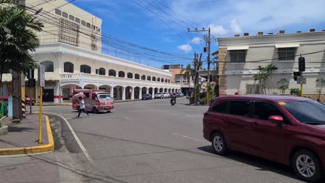 Traffic-in-Downtown-Cebu-City,-Philippines-on-Hot-Sunny-Day,-Slow-Motion