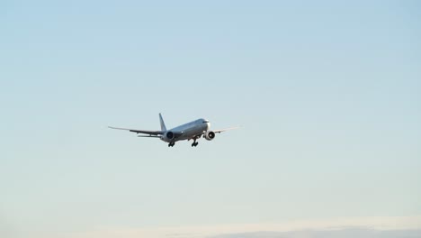 Commercial-Flight-With-Air-Canada-Airplane-Against-Clear-Sky