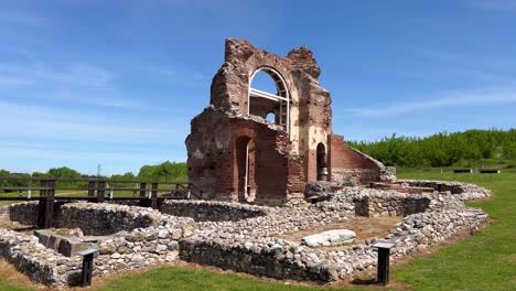 The-red-church-near-the-city-of-Perushtitsa-against-the-blue-sky