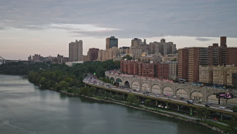 NYC-New-York-Aerial-v247-drone-flyover-Hudson-river-capturing-Washington-Heights-neighborhood,-traffics-on-riverside-drive-way,-and-Upper-Manhattan-cityscape---Shot-with-Inspire-3-8k---September-2023