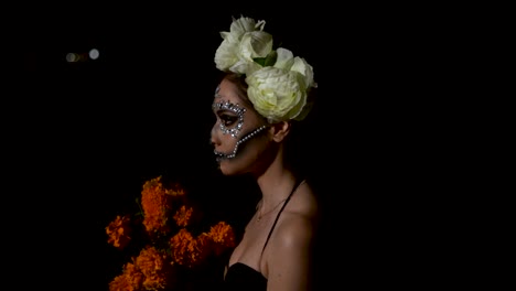 Footage-of-a-model-dressed-as-Catrina-walking-in-the-darkness
