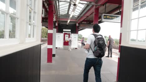 Walking-up-the-stairs-at-Northwick-Park-Tube-Station,-Metropolitan-Line-in-Harrow,-London