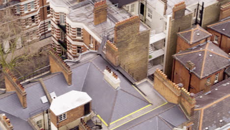 This-shot-depicts-a-panoramic-aerial-view-of-London-with-a-clear-outlines-of-the-typical-house-rooftops-of-people-living-in-Westminster