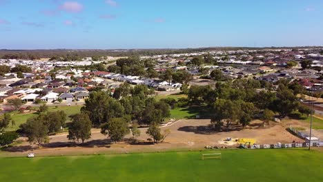 Wide-aerial-view-of-all-abilities-park-construction-progress-at-Riverlinks-Park,-Clarkson-Perth