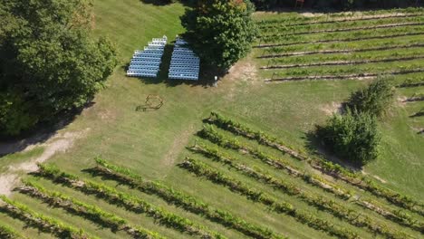 Over-head-shot-of-wedding-ceremony-set-up-in-a-vineyard