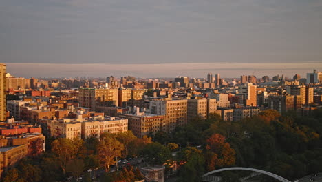 NYC-New-York-Aerial-v251-drone-flyover-Hamilton-Heights-residential-area-capturing-Riverbank-State-Park-and-sunset-glow-over-the-cityscape-of-Upper-Manhattan---Shot-with-Inspire-3-8k---September-2023