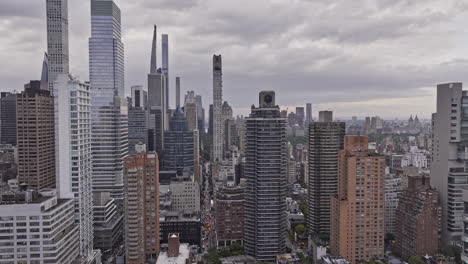 NYC-New-York-Aerial-v326-flyover-Midtown-Manhattan-along-60th-St-towards-Central-park-capturing-upscale-Lenox-Hill-neighborhood-and-urban-cityscape---Shot-with-Mavic-3-Pro-Cine---September-2023