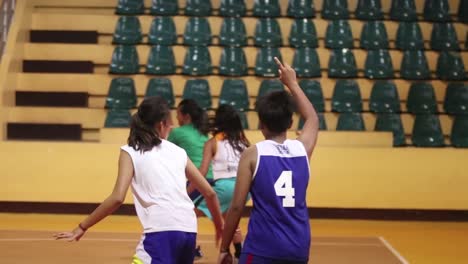 Young-Asian-Girls-Playing-Basketball