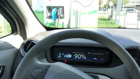 Electric-car-from-the-drivers-seat-while-it's-charging