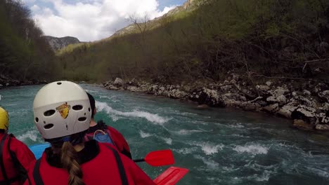 Rafting-on-river,-one-paddle-without-helmet-and-splash-goes-into-the-raft---paddler-point-of-view