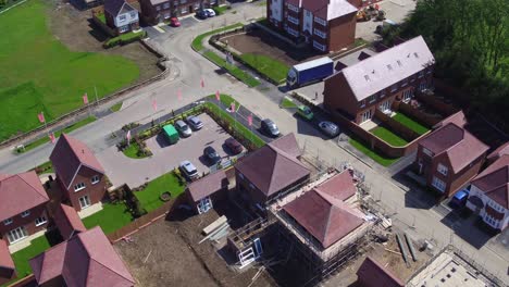 Aerial-fly-though-of-the-Redrow-homes-development,-Manor-Park-in-Rainham,-Kent