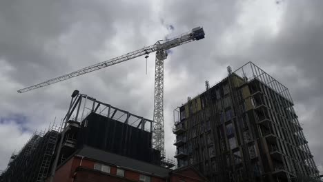 Panning-shot-of-the-sky-down-to-the-buildings-under-construction-in-Dublin