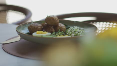 delicious-food-in-fancy-restaurant-close-up-shot,tilt-left-shot