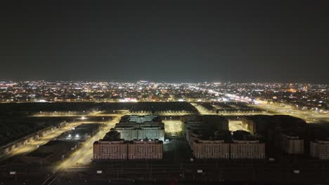 Drone-fly-over-shot-of-Jaddah's-city-lights-at-night-showcasing-the-road-infrastructure-and-the-urban-lights