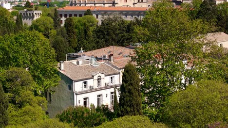 Aerial-establishing-shot-of-a-mansion-near-the-churches-in-downtown-Montpellier