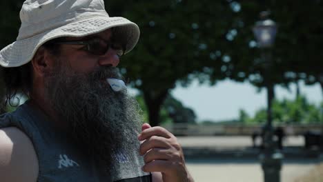 Slow-motion-shot-of-a-man-blowing-a-whistle-for-the-sports-games-to-start