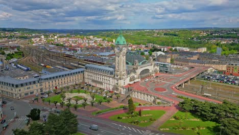 Limoges-Benedictins-station,-France.-Aerial-drone-orbiting