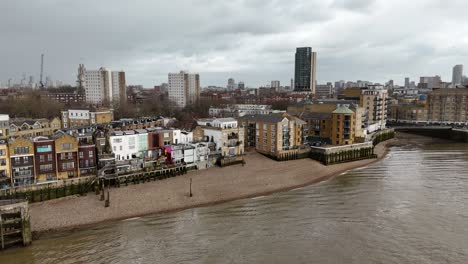 Colourful-apartments-Wapping-London-UK-riverside-apartments-drone,aerial