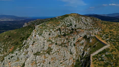 Aerial-Drone-reveals-Acrocorinth-monolithic-rock-hills-over-ancient-Greek-city