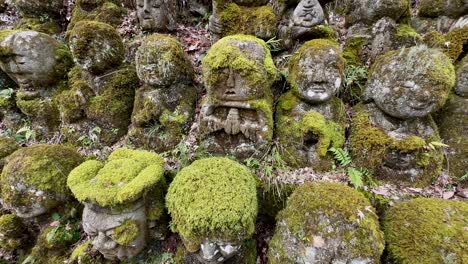 Pull-back-from-the-Rakan-statues-of-the-Otagi-Nenbutsuji-Temple-in-Kyoto-Japan