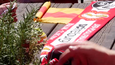 DFB-Cup-2022-SC-Freiburg-fan-scarf-lies-on-a-table