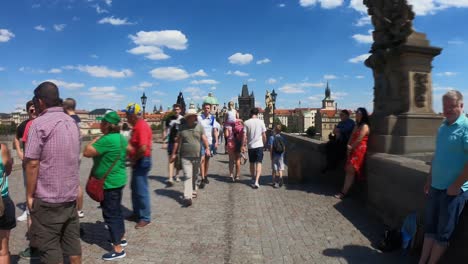 Camera-goes-through-the-Charles-bridge-filled-with-people