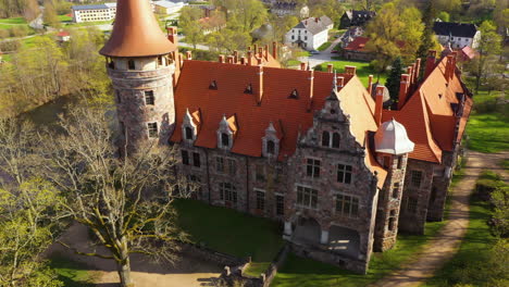 Aerial-view-of-Cesvaine-castle-rear-side-on-a-sunny-summer-day