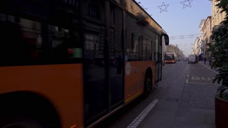 Eco-friendly-public-transport-buses-effectively-transporting-people-around-the-historic-city-of-Mantua