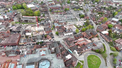 High-angle-pull-back-drone-aerial-reverse-reveal-Tamworth-Staffordshire,-UK-drone,aerial