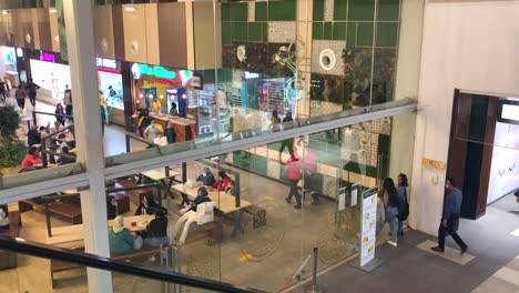 Scene-Inside-Arribat-Centre-Shopping-Mall-With-Customers-Walking-And-Relaxing-At-The-Foodcourt