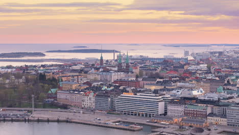 Sunset-aerial-view-over-Helsinki-Punavuori-neighborhood,-Finland