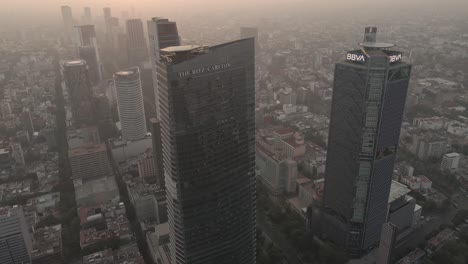 Aerial-glimpse-of-skyscrapers-on-Paseo-de-la-Reforma-in-Mexico-City-on-a-day-with-poor-air-quality