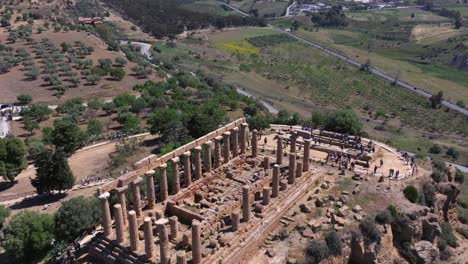 Aerial-Pullback-Reveals-Ancient-Greek-Temple-of-Hera-at-Valley-of-the-Temples,-Agrigento,-Italy