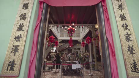 Establishing-Shot-Entering-the-Front-of-Pinang-Peranakan-Mansion,-Penang